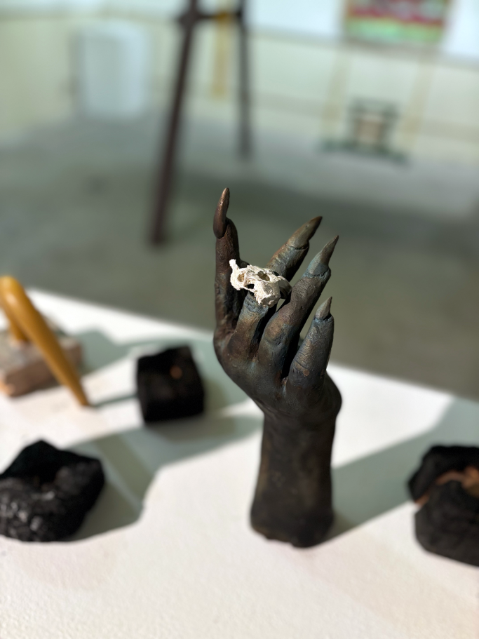 reaching-hand-and-silver-skull-ring